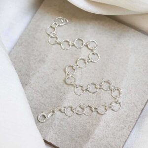 Sterling Silver Shimmer Link Bracelet on stone background