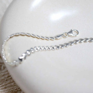 Sterling Silver Love Chain Bracelet on ceramic