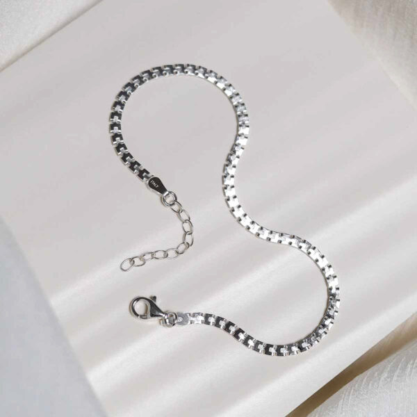 Sterling Silver Greek Box Chain Bracelet on ceramic