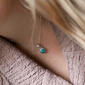 Sterling Silver Turquoise Birthstone Necklace on model with satellite chain