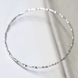 Sterling Silver Fine Twisted Bangle on white background