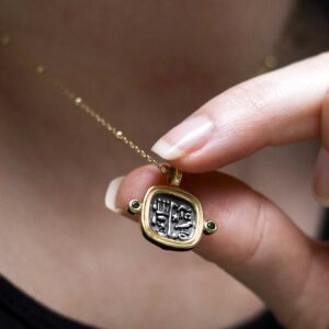 Gold Plated Sterling Silver Hieroglyphics Square Necklace worn by model with black t shirt.