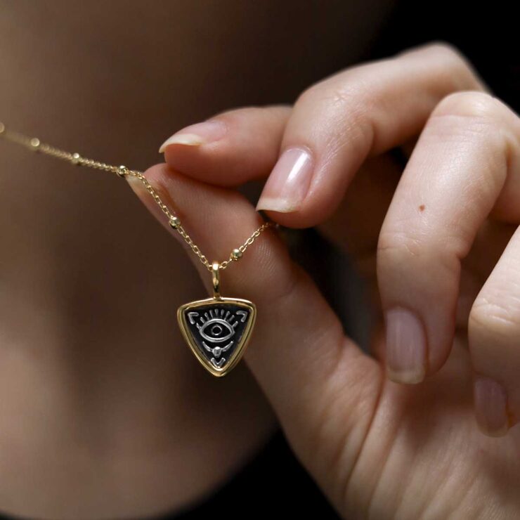 Gold Plated Sterling Silver Evil Eye Necklace worn by model with black t shirt