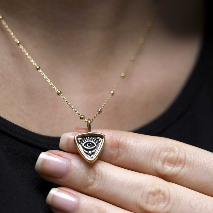 Gold Plated Sterling Silver Evil Eye Necklace worn by model with black t shirt